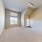 Large Open Bright LIving Room with Tall Windows